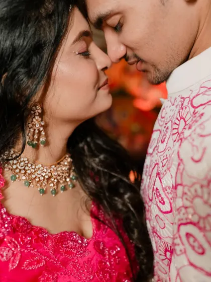 An intensely romantic close-up of the couple from their Sangeet night. This shot is all about the chemistry and connection, capturing a quiet moment of love.