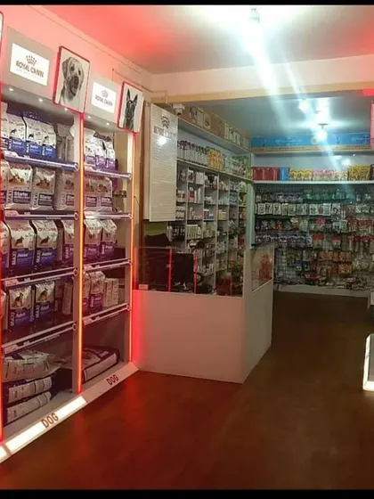 Our store is lit to showcase the incredible variety of products we offer. This shot highlights our main dog food aisle, packed with options for every breed.