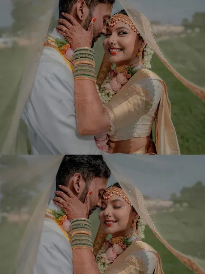 An artistic shot of the couple under the bride's veil. Her makeup, featuring a bold red lip, looks stunning.