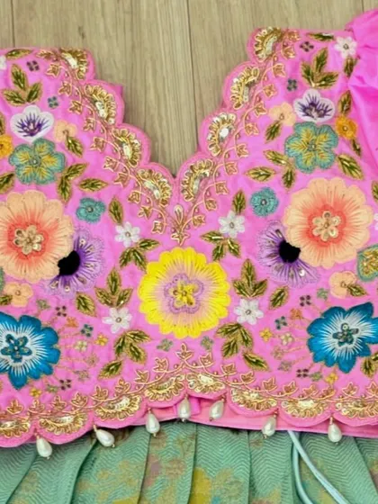 A closer look at the exquisite hand embroidery on one of my blouses. This level of detail, known as maggam work, is what makes each piece a unique work of art.