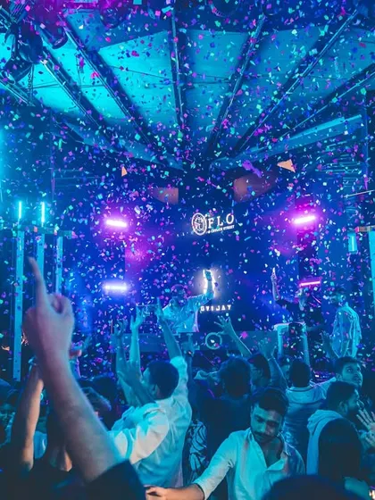 That moment when the beat drops, the confetti flies, and the whole crowd is one. This shot from a packed night at Flo, Bangalore, perfectly captures the peak energy and celebration of a Shor Bazaar night.