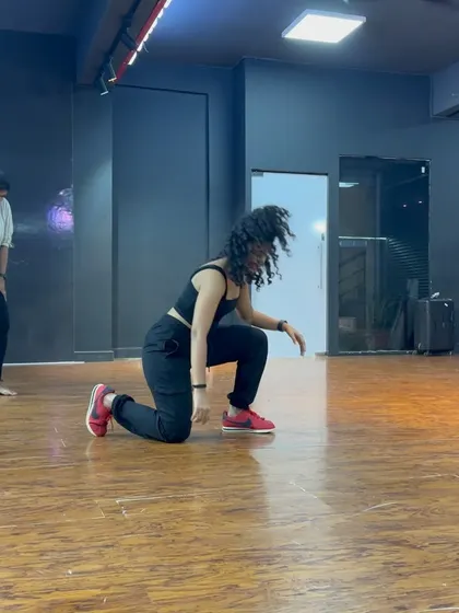 Grounded and connected to the floor. So much of expressive dance is about feeling the earth beneath you and letting that connection inform your movement and release.