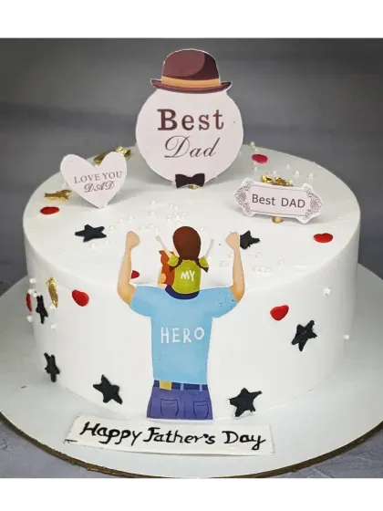 A "Best Dad" cake for Father's Day. This fresh pineapple cake has a simple design with a "My Hero" topper.