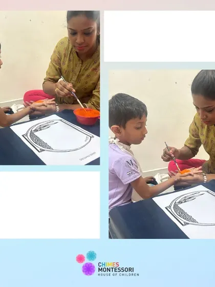 An adult paints a child's hand for a handprint art activity, a moment of gentle guidance and connection.