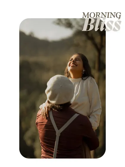 A joyful, sun-drenched portrait of a couple in a field. This image captures the happiness and warmth of their relationship.