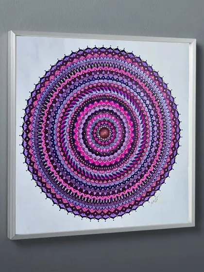 This large 2x2 feet 'Magenta State of Mind' mandala is shown in a simple white frame. The intricate layers of magenta and purple create a mesmerizing effect that draws you into the center.