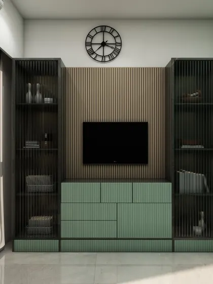 The TV and storage unit in the same bedroom, featuring a mix of open and closed shelves for both display and practical storage.