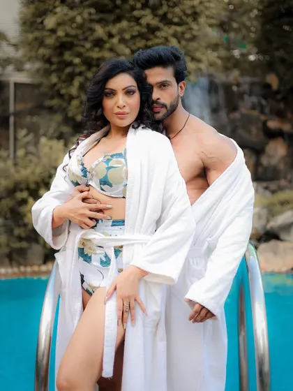 A classic couple's pose, perfect for promotional content or a personal shoot.