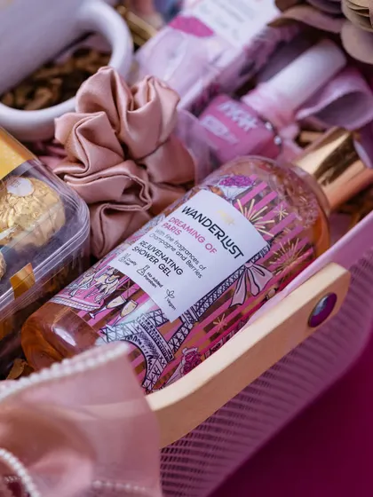 A close-up of the curated items in the friendship hamper, showing the textures and colors of the products.