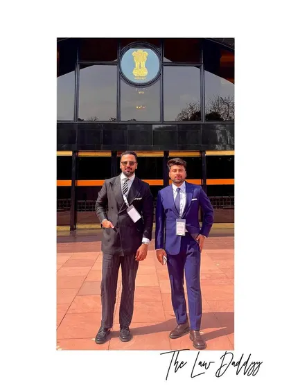 With my colleague outside Vigyan Bhawan for an international legal conference on the future of global trade. Engaging with these topics is crucial for advising clients in an interconnected world.
