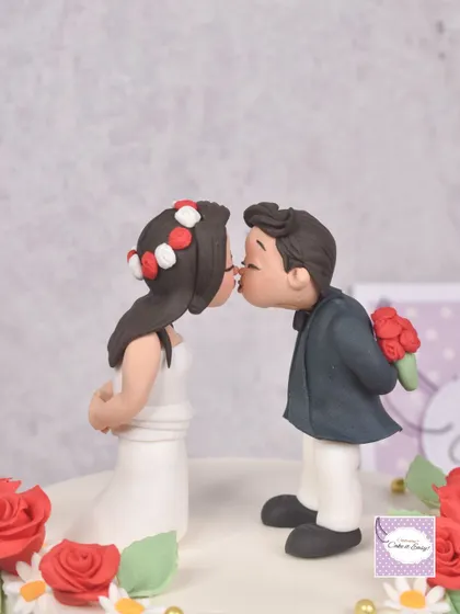 Another view of the romantic anniversary cake topper. Creating these small, detailed figurines is a great way to add a personal touch when a plastic topper just won't do.