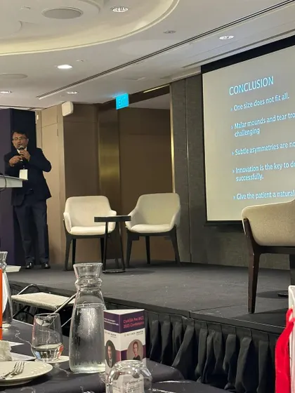 On stage at the CyAsia conference, delivering my presentation on the challenges and nuances of using fillers for subtle and natural-looking results.