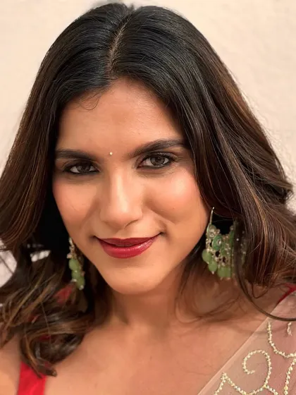 A beautiful portrait of Vainidhi. The classic makeup enhances her features and gives her a confident, diva-like presence.