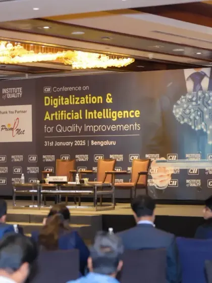 This image shows a presenter at a lectern during the CII conference on AI. It's a classic, professional shot that documents the formal proceedings and keynote addresses of your event.