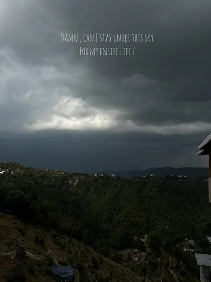 A dramatic, cloudy sky over the mountains. I love capturing the raw and powerful beauty of nature.