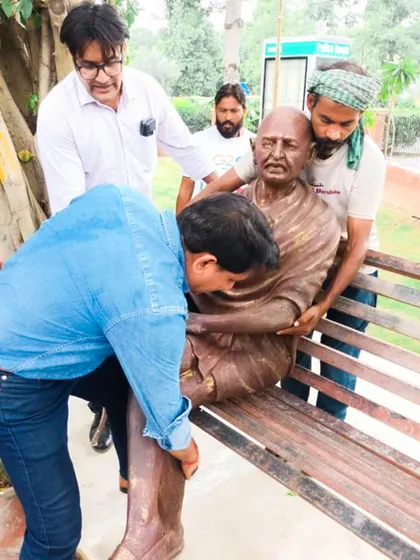 A behind-the-scenes moment during the installation of a Gandhi statue at Gandhi Smriti Park. This image captures the hands-on effort and dedication that goes into creating these significant public memorials.