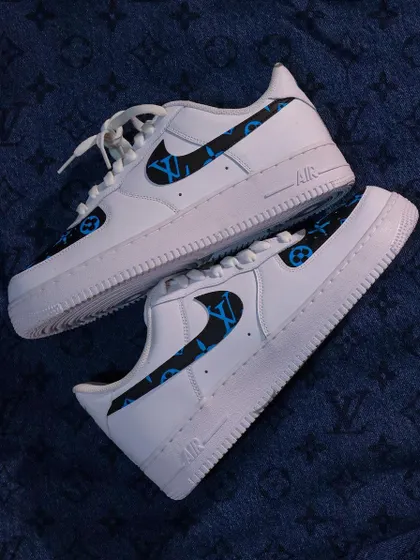 If you love luxury patterns, I can bring that vibe to your sneakers. Here, I hand-painted the iconic Louis Vuitton monogram pattern in blue on a pair of classic white Nike Air Force 1s.