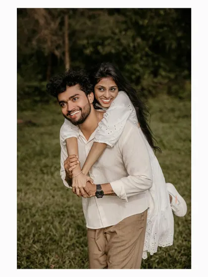 A fun and joyful piggyback ride, capturing the couple's playful spirit during their pre-wedding shoot.