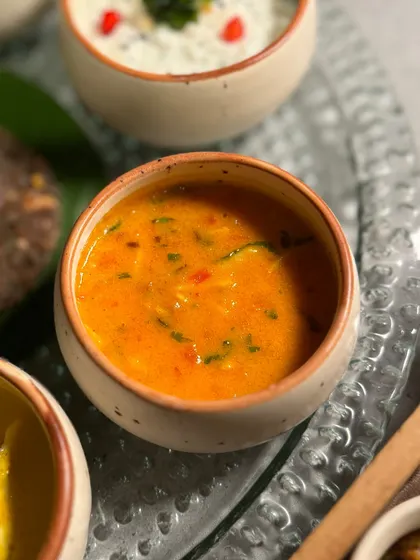 A vibrant, tangy tomato-based curry from our Navratri feast.