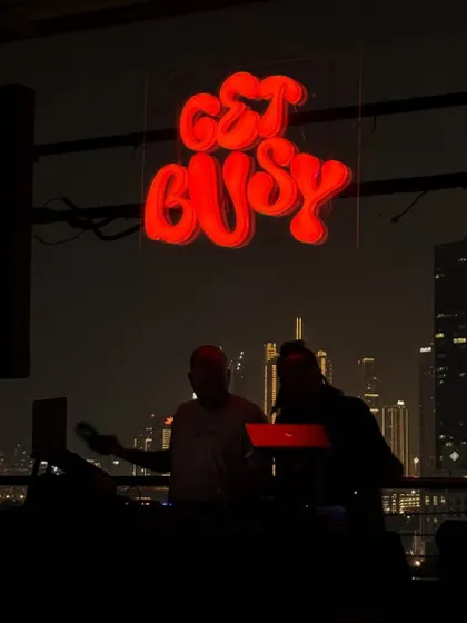 DJing against the Dubai skyline. Playing a rooftop set with the city lights behind me is a vibe of its own.