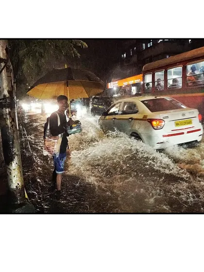 My commitment to you, rain or shine. This is one of my dedicated team members, Sonu, braving the heavy Mumbai monsoon to ensure your hot, homemade meal reaches you on time. We believe nothing should come between you and ghar ka khaana.