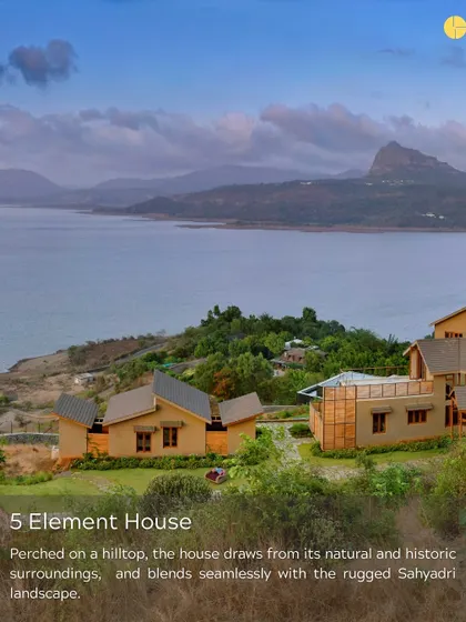 The 5 Element House is perched on a hilltop, blending seamlessly with the rugged Sahyadri landscape. The design draws from its natural and historic surroundings, becoming a part of the land itself.