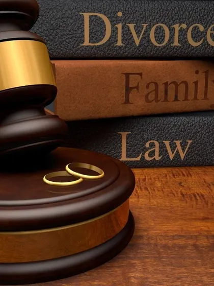 My practice is built on a deep understanding of family law and divorce statutes. These law books signify the legal foundation I use to build a strong case for every client seeking a divorce.