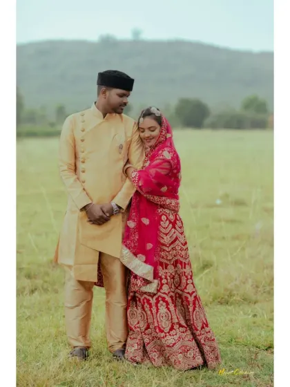 A sweet moment between a Muslim bride and groom during their outdoor photoshoot.