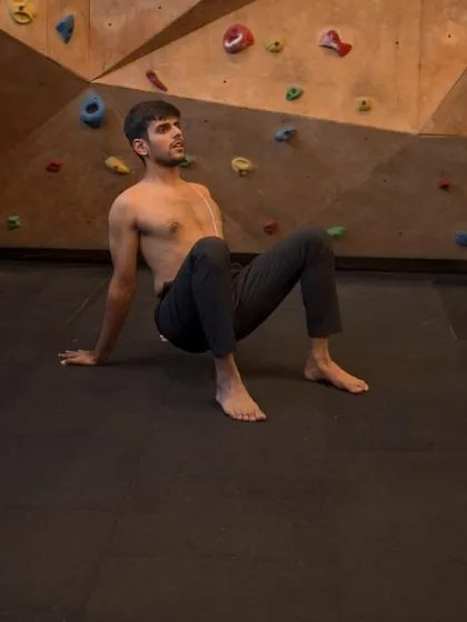 This image shows the modified crab position, which is the end point for both the Scorpion Switch and Full Scorpion. Mastering this position is key to transitioning smoothly between movements.