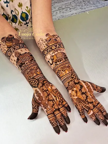 A bridal design filled with royal elephants and traditional instruments, perfect for a classic wedding look.