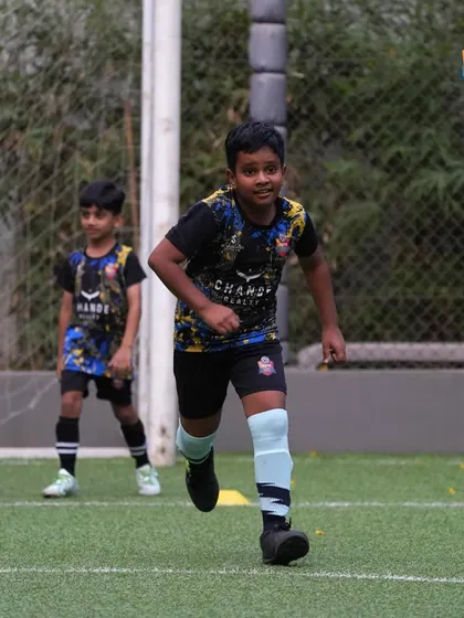 Explosive speed in action. A player at our Oberoi Turf location bursts into a sprint, a core component of our training designed to improve acceleration and top speed.