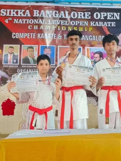 Three of my students on the podium after winning medals at the Sikka Bangalore Open.