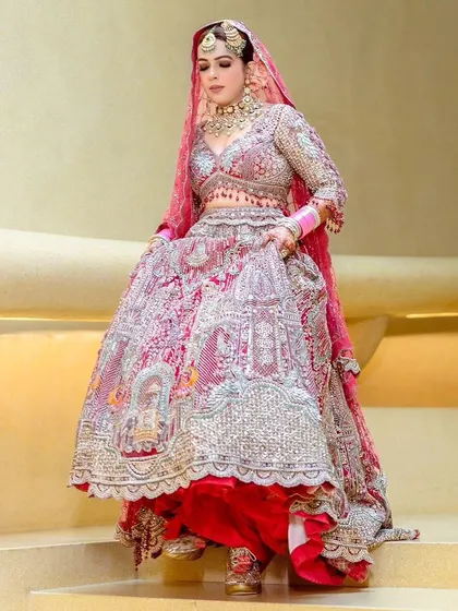 The bride looking regal in her full wedding attire.