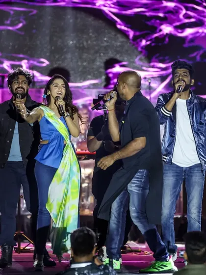 The full lineup of singers on stage with Mithoon at BBD University, Lucknow, showcasing the grand scale of the collaboration.