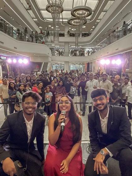 A great photo with the audience after our performance for the opening of M5 E-City Mall. We love meeting our listeners and making new friends at every gig.
