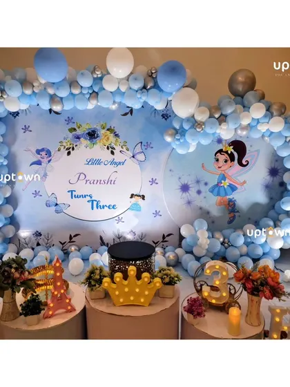 Another view of the blue fairy theme with a circular backdrop.