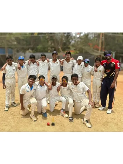 The U-14 team poses with our head coach after a dominant performance in the Summer Carnival tournament.