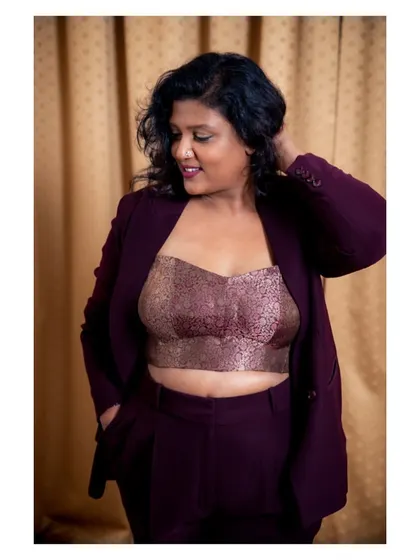 Who says workwear has to be boring? I designed and created this entire pantsuit, including the brocade corset, to prove that power dressing can be personal. I make bespoke western and Indo-Western outfits that are tailored to your body and your style.