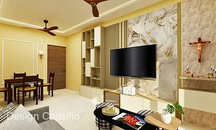 This living room design incorporates a sacred altar for a Christian family, seamlessly blending it with the TV unit. The use of a marble-finish back panel and gold accents ties the entire wall together beautifully.