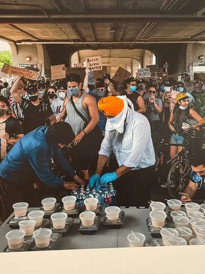 This photo captures a community action event, a theme often explored in my talks at places like the Museum of the City of New York. My speaking work frequently connects to exhibitions on activism, religion, and urban space, highlighting the role of desi communities in shaping the city.
