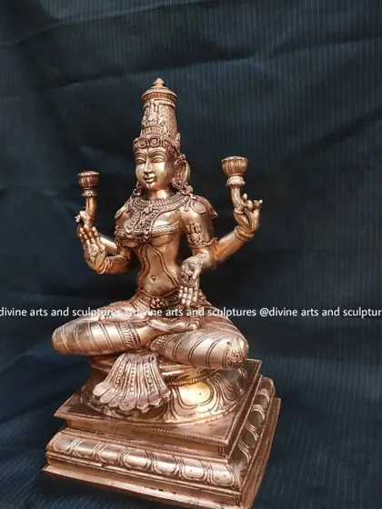 A different perspective of the 12-inch Lakshmi, showcasing the craftsmanship of the tiered base and the delicate features of the goddess.