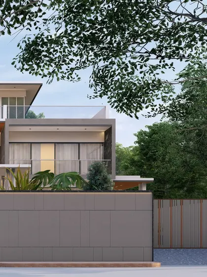 Another perspective of the 'Zen Oasis' facade. This view highlights the clean, grey paneling of the compound wall and the lush greenery that peeks out from behind, creating a sense of privacy and natural beauty.