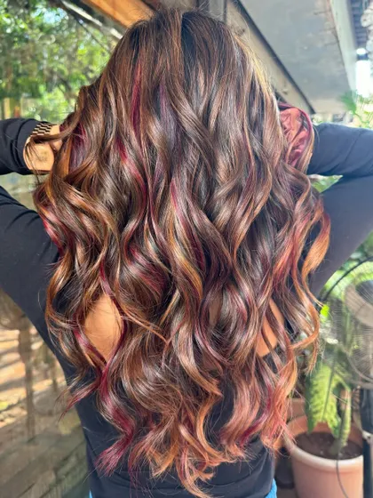 Another angle of the red and caramel blend. The curls really make the colors pop. (No filter)