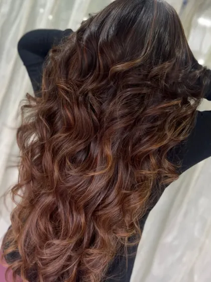 The back view of this rich brown style, showing off the incredible length, volume, and shine.