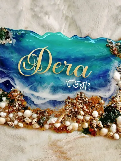 Bringing some ocean vibes to your feed. A custom-designed nameplate with realistic resin waves, sand, and seashells.