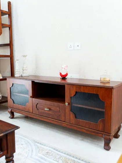 The full TV console, a beautiful and functional piece that combines classic design elements with practical storage.