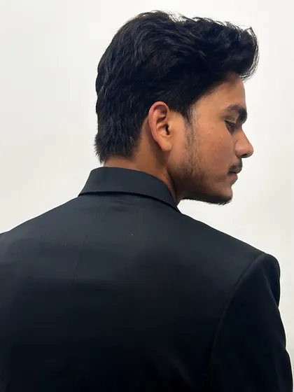 A profile shot that captures a moment of thought. I am always rediscovering myself and pushing my boundaries, and I encourage my students to do the same.