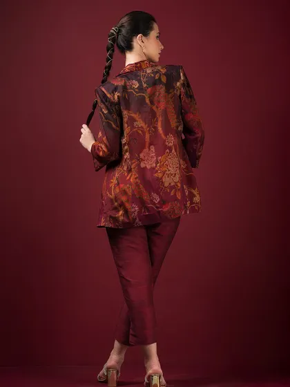 The back view of the printed blazer set, highlighting its sharp tailoring and unique pattern.
