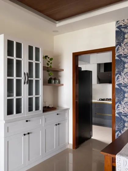 Another view of the English-style crockery unit, showing its placement next to the kitchen entryway.