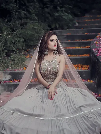 The full look of the grey lehenga, perfect for creating a dramatic and romantic vibe. The flowing skirt and delicate dupatta are made for beautiful pictures.